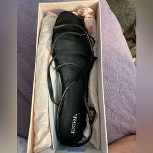 Black sandals with bling size 11.  Never worn